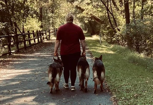 Customer-Walking-Two-Dogs.jpg