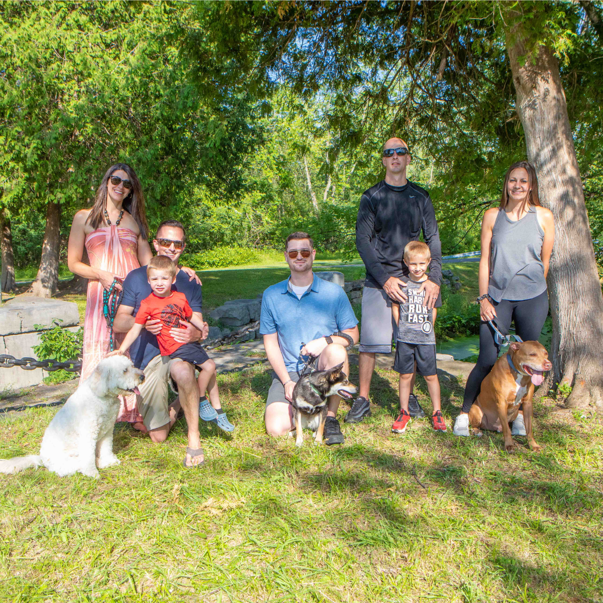 family and friends with dogs